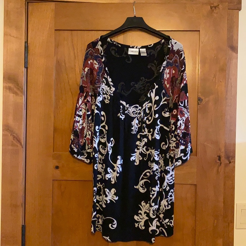 Beautiful print tunic length Chicos top, with three-quarter sleeve, size large.